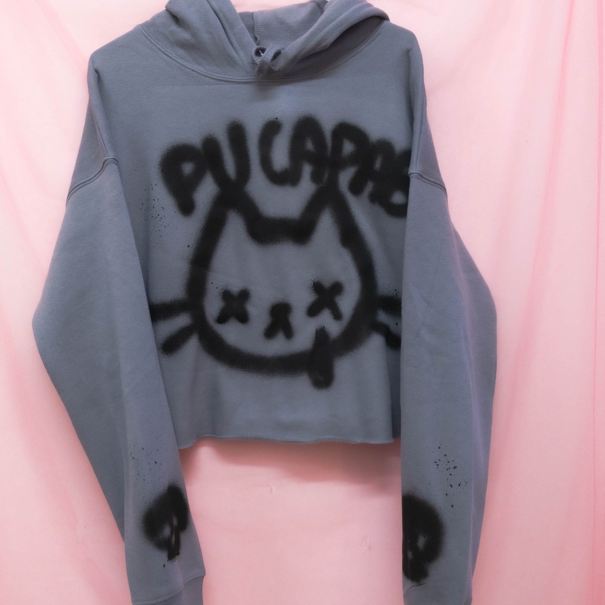 Chandail à capuchon coupé "Pu capab'" unique (L)