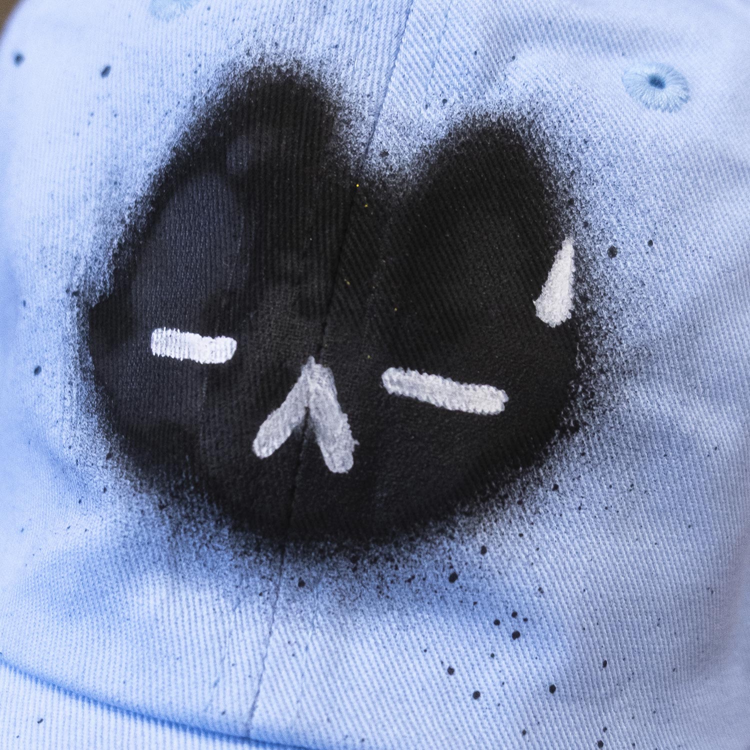 Casquette bleue "chat noir exaspéré" unique