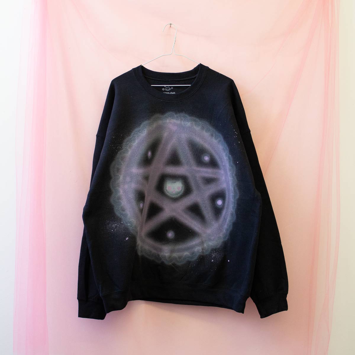 Spray painted coquette pentacle crewneck