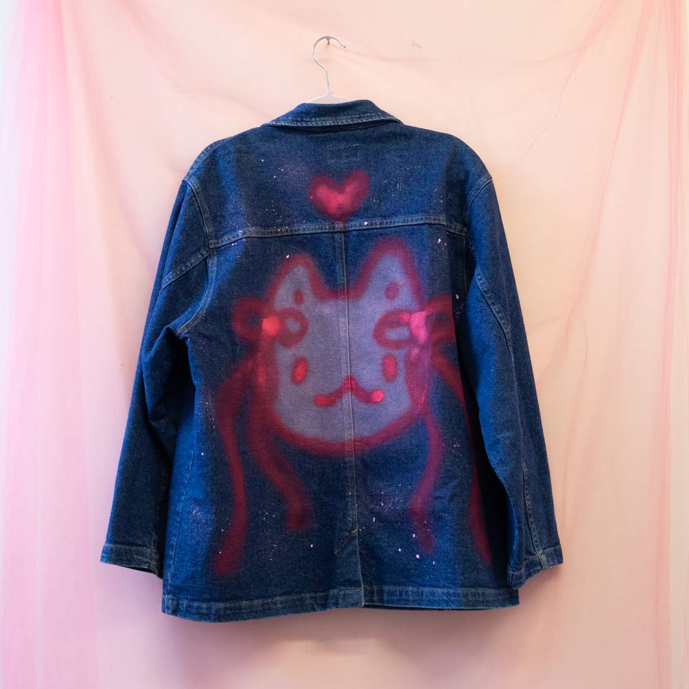 Upcycled spray painted denim jacket — cat with ribbons