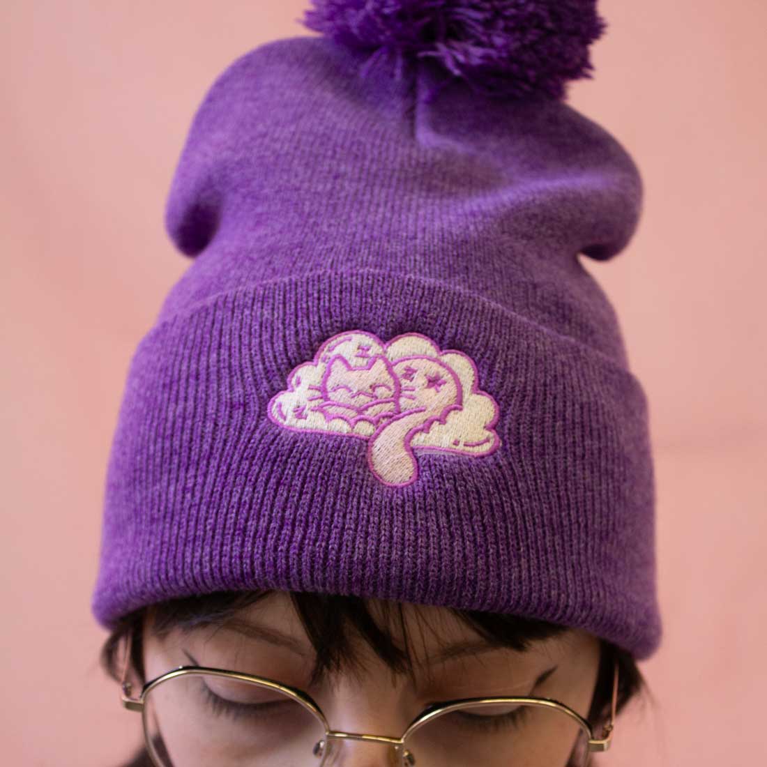 Tuque mauve sieste paisible