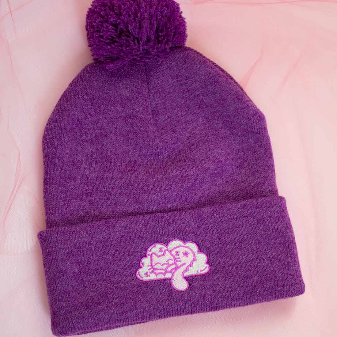 Tuque mauve sieste paisible