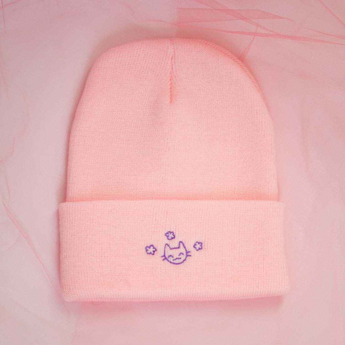 Tuque rose chaton content