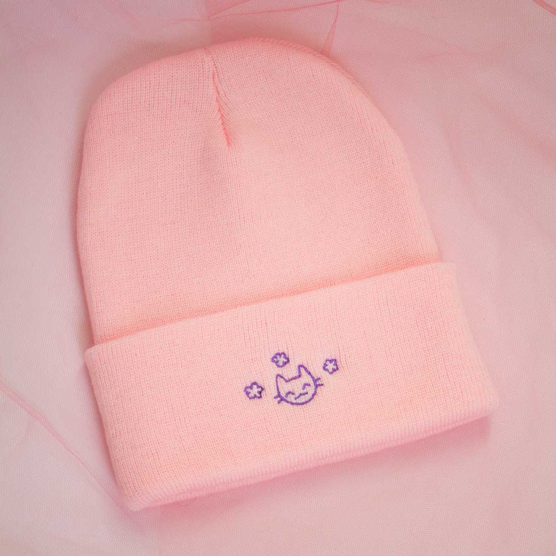 Tuque rose chaton content