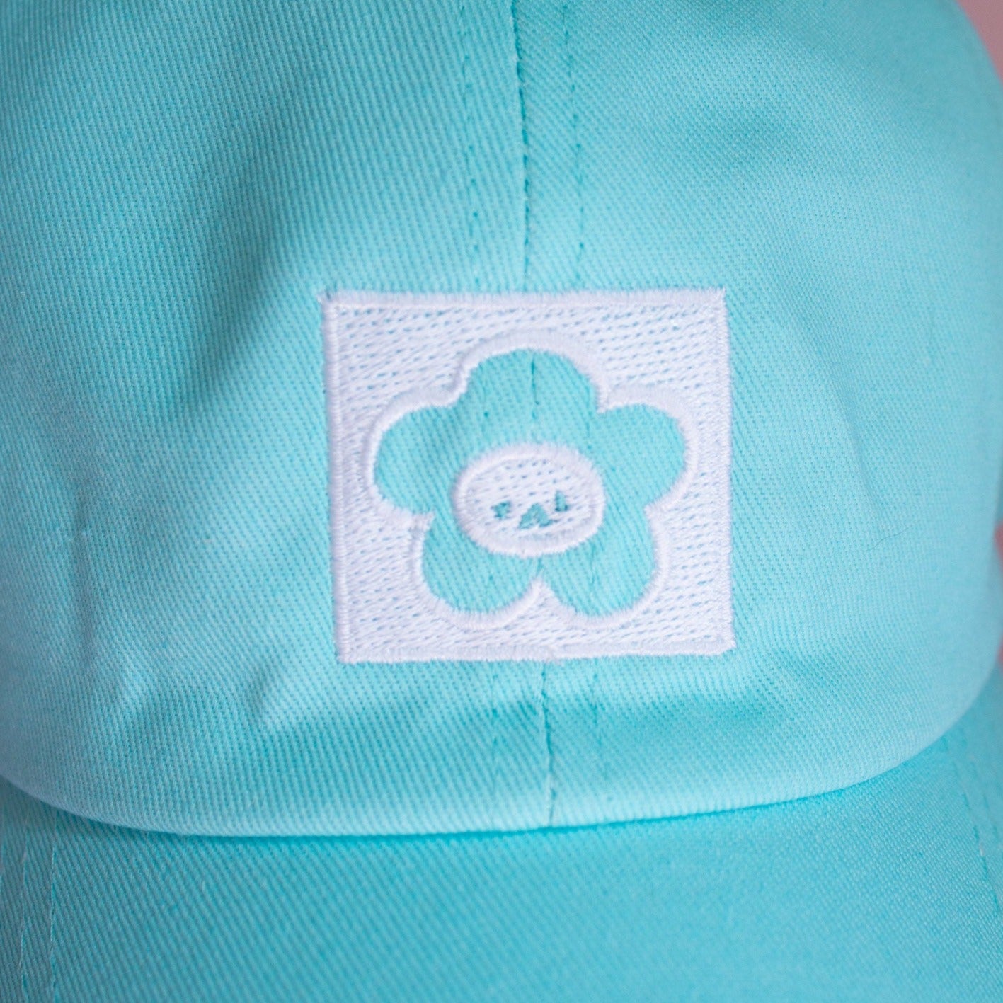 Casquette fleur "Ok" turquoise