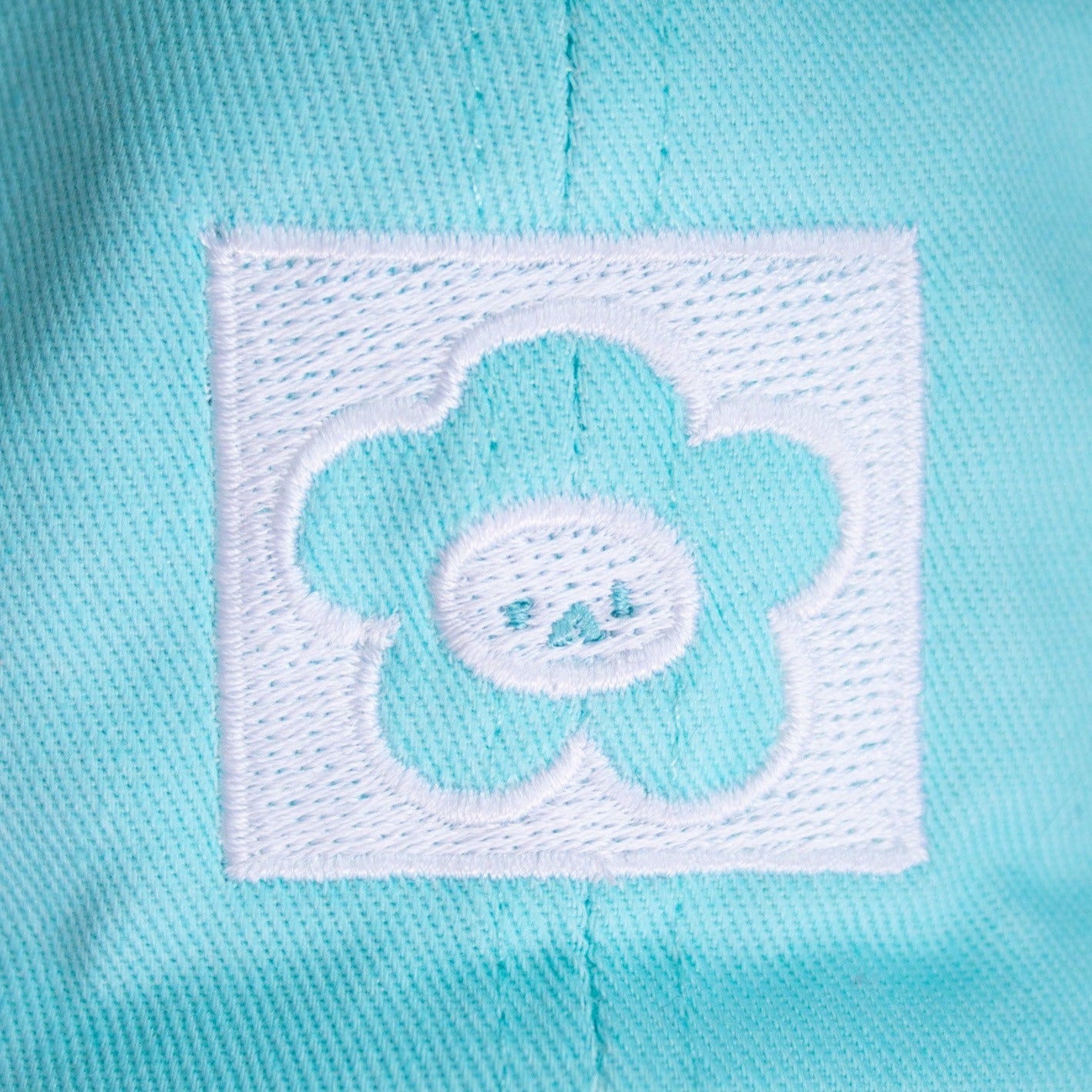 Casquette fleur "Ok" turquoise